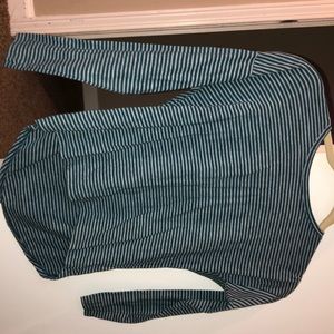 A girl’s shirt gray and dark green size 8